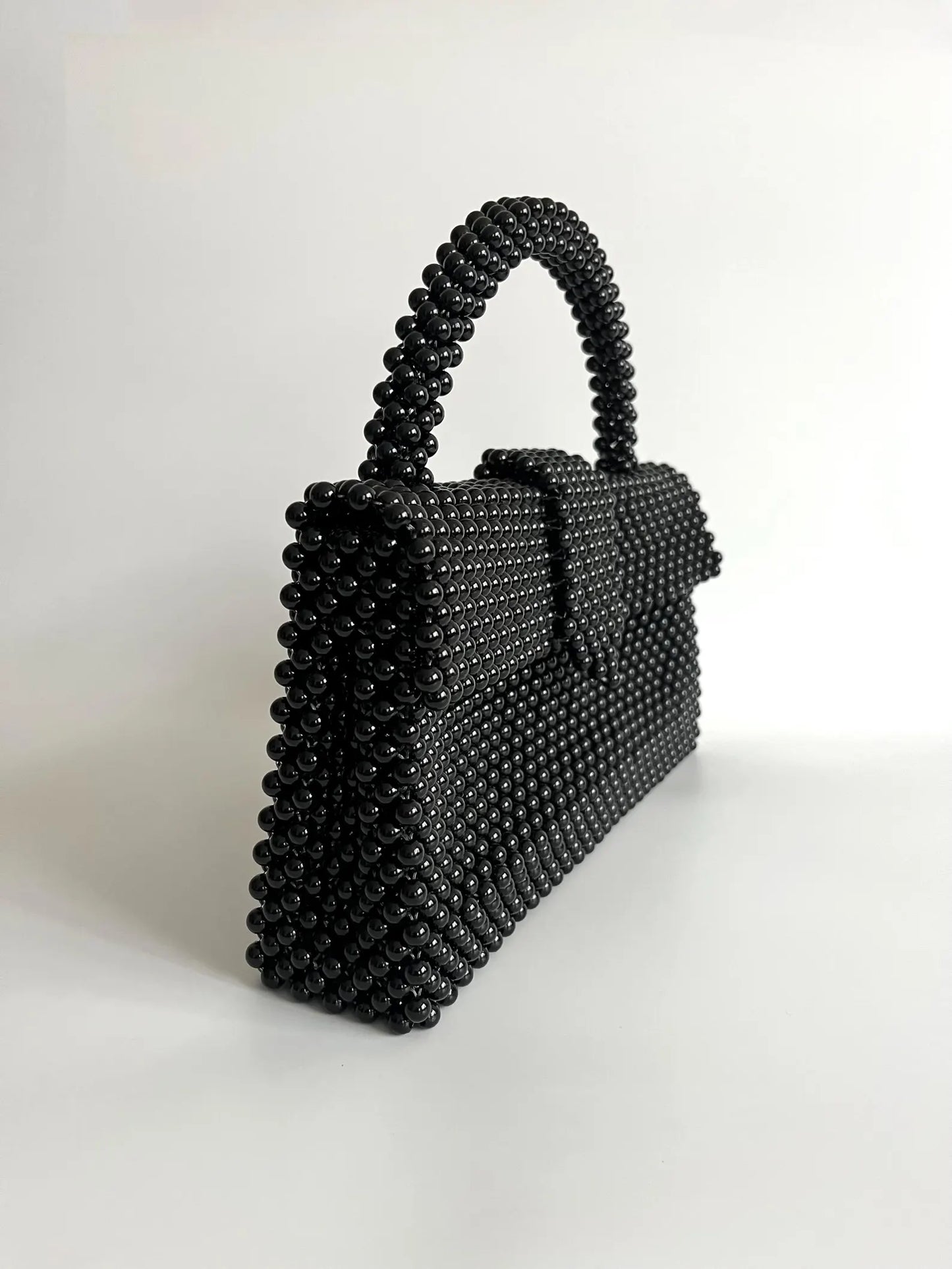 The Black Pearl Top Handle Bag